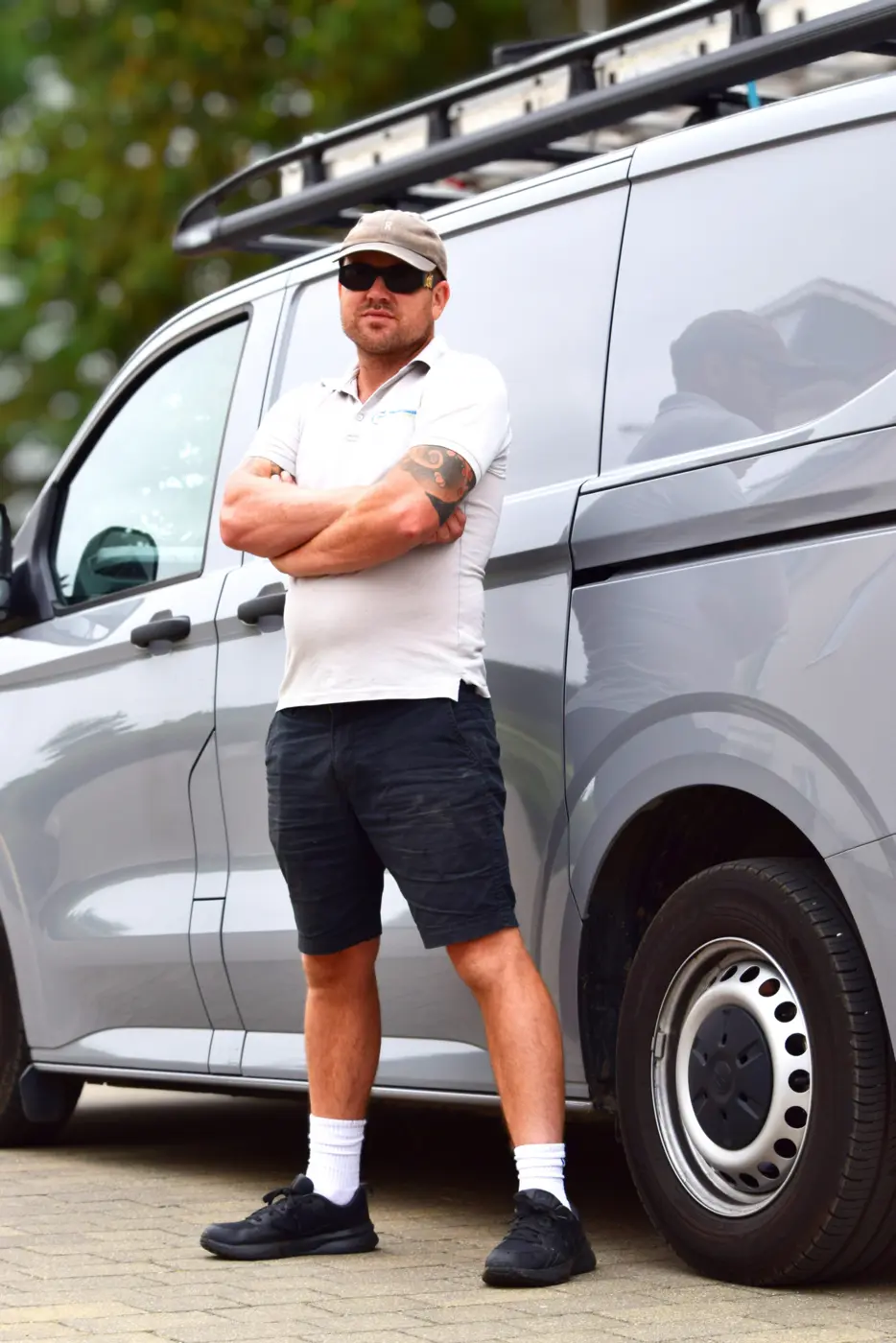Chelmer Window Cleaning professional beside company van