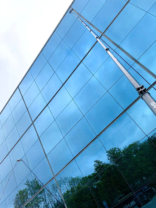 Commercial water-fed pole window cleaning